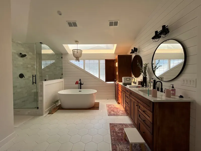 Freshly painted primary bathroom with white shiplap walls